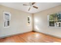 Bedroom featuring hardwood floors, a ceiling fan, and good natural lighting at 1523 Silver Star Rd, Orlando, FL 32804