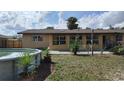 Spacious backyard with above ground pool, patio area and ample space for outdoor entertaining and gardening at 210 Dartmouth St, Deltona, FL 32725