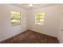 Bright bedroom with natural light with carpet flooring and a ceiling fan at 1801 Riley Ave, Orlando, FL 32805