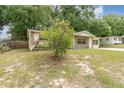 Charming home with stone accents and a lush lawn, offering great curb appeal and a welcoming atmosphere at 3675 Rundo Dr, Orlando, FL 32818