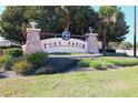 Stone Fore Ranch community sign surrounded by lush landscaping, creating a welcoming entrance at 4175 Sw 46Th Ct, Ocala, FL 34474