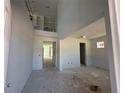 Spacious living room showing open floor plan, high ceilings, and abundant natural light at 726 Pointe Emerson Blvd, Apopka, FL 32703