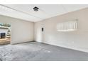 Finished bonus room with concrete floor, simple electrical, and access to yard at 1202 Ferndell Rd, Orlando, FL 32808