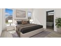 Bright main bedroom featuring a plush bed, stylish nightstands, and an ensuite bathroom at 15240 Sw 43Rd Ct, Ocala, FL 34473
