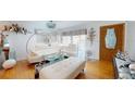 Stylish living room with modern decor, hardwood floors and bright, natural light at 3520 Arch St, Orlando, FL 32808