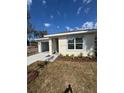 A single Gathering home with a driveway, window and manicured lawn at 1007 Colyer St, Orlando, FL 32805