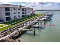 Building exterior view with boat slip and waterfront access at 2100 N Peninsula Ave # 1020, New Smyrna Beach, FL 32169