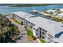 Exterior view of the building with waterway views and balconies at 2100 N Peninsula Ave # 1020, New Smyrna Beach, FL 32169