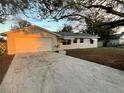 Charming one-story home with a well-maintained front yard and concrete driveway at 2525 Ashland Blvd, Orlando, FL 32808