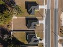 Aerial view of a new construction home with a spacious yard, bordered in white at 325 Marion Oaks Trail, Ocala, FL 34473