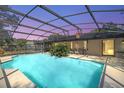 Relaxing screened-in pool area perfect for outdoor entertaining and enjoyment at 328 Bridle Path, Casselberry, FL 32707