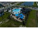 Aerial view of the community pool and playground area at 5096 Shady Pines Dr, St Cloud, FL 34772