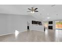 Spacious living room with tile floors and ceiling fan at 13258 Sw 29Th Cir, Ocala, FL 34473