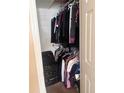 Walk-in closet with clothing and storage, providing organization and space at 1695 Lee Rd # B109, Winter Park, FL 32789