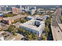 Expansive aerial view of the residential complex, displaying the surrounding neighborhood and the nearby highway at 206 E South St # 1030, Orlando, FL 32801