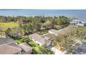 An aerial view of the home and yard with stunning lake views at 154 Desiree Aurora St, Winter Garden, FL 34787