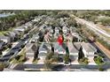 Aerial view of a neighborhood with a red pin marking the property's location in a residential area at 1139 Sand Creek Loop, Ocoee, FL 34761