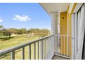 Balcony with a golf course view at 1338 Seven Eagles Ct # 302, Reunion, FL 34747