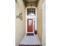 Close-up of the front door, showing a decorative glass window and a 'Welcome' mat at 53 High Vista Dr, Davenport, FL 33837