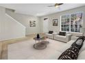 Inviting living room with natural light, showcasing neutral tones and a welcoming atmosphere at 211 Stardale Ln, Altamonte Springs, FL 32714