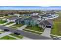 Areal view of a Primary-planned community showing several homes and well-maintained landscaping at 1629 Hill Park Dr, Deltona, FL 32725