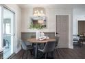 Bright dining area with modern lighting and stylish decor at 8042 Tompkins Sq, Orlando, FL 32807