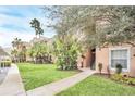Well-manicured grounds enhance this beautiful building's exterior at 13500 Turtle Marsh Loop # 839, Orlando, FL 32837