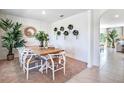 Tastefully decorated dining area showcasing a wooden table, and a modern design at 7104 Painted Bunting Way, St Cloud, FL 34773