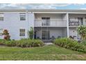 A relaxing outdoor patio and balcony offers a private retreat in this lovely condo at 224 Lewfield Cir, Winter Park, FL 32792