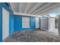 Cozy patio area featuring a white door and fence providing privacy at 2743 Grandola Dr, Orlando, FL 32811