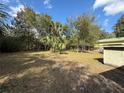 Expansive backyard offering plenty of space for outdoor activities, gardening, and enjoying nature at 1348 Cr 605, Bushnell, FL 33513