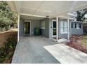 Spacious carport with ample parking and convenient access to the front door at 1416 Braebury Dr, Leesburg, FL 34748