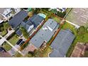 Property highlighted by boundary lines showing its location and surrounding homes and well-manicured lawns at 1611 Chestnut Ave, Winter Park, FL 32789