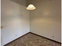 A cozy dining area featuring tiled flooring, a pendant light, and neutral wall color at 1811 Springwood Ln, Deltona, FL 32725