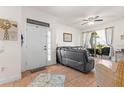 Inviting living room showcases tile floors and sliding glass doors to the lanai at 13101 Summerton Dr, Orlando, FL 32824