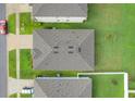 Overhead view of roof shows a well-maintained shingle roof, clean lines, and efficient layout at 3871 Brant Pl, Leesburg, FL 34748