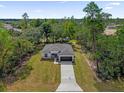 Beautiful home with ample yard space surrounded by lush greenery at 13817 Sw 43Rd Cir, Ocala, FL 34473