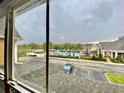 Scenic view from the building of the community pool, providing a relaxing backdrop for residents at 2605 Gala S Rd # 103, Kissimmee, FL 34746