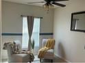 Bright sitting area with natural light and comfortable seating at 504 Delido Way, Kissimmee, FL 34758