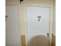 Unit 4109's front door with classic hardware in a clean hallway at 4109 Dijon Dr # 4109H, Orlando, FL 32808