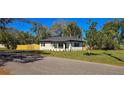 Charming single-story home boasts fresh exterior paint and manicured landscaping, enhancing curb appeal at 1322 Maryland Ave, St Cloud, FL 34769