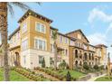 Beautiful townhome exterior featuring multiple levels, manicured landscaping, and inviting curb appeal at 2041 Lobelia Dr, Lake Mary, FL 32746