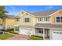 Beautiful two-story home featuring a two car garage, brick driveway, and nicely maintained landscaping at 4820 Battaglia Blvd, St Cloud, FL 34769