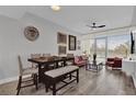 Open living space featuring a modern dining set and living room with lots of light at 101 S Eola Dr # 509, Orlando, FL 32801