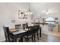 Elegant dining room with a modern chandelier and stylish decor at 130 Bloomingdale Dr, Davenport, FL 33897