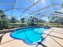 Enclosed pool area, featuring a pristine pool with a clear blue sky at 777 Crepe Myrtle Cir, Apopka, FL 32712
