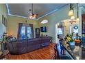 Comfortable living room with hardwood floors, a ceiling fan, and recessed lighting at 290 Thomas Dr, Casselberry, FL 32707