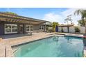 Backyard pool with a spacious patio for relaxing and enjoying the sun at 4210 Shorecrest Dr, Orlando, FL 32804