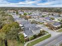 Desirable neighborhood with lush greenery and well-maintained homes in a tranquil setting at 5852 Mariposa Cove Ln, Orlando, FL 32822