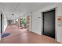 Exterior hallway with a bank of elevators at 100 S Interlachen Ave # 304, Winter Park, FL 32789